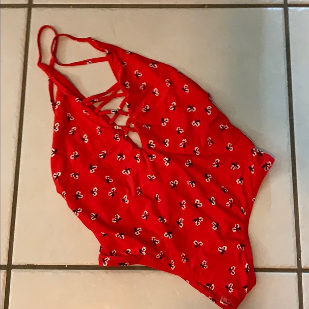Billabong red swimsuit with flower pattern SIZE S